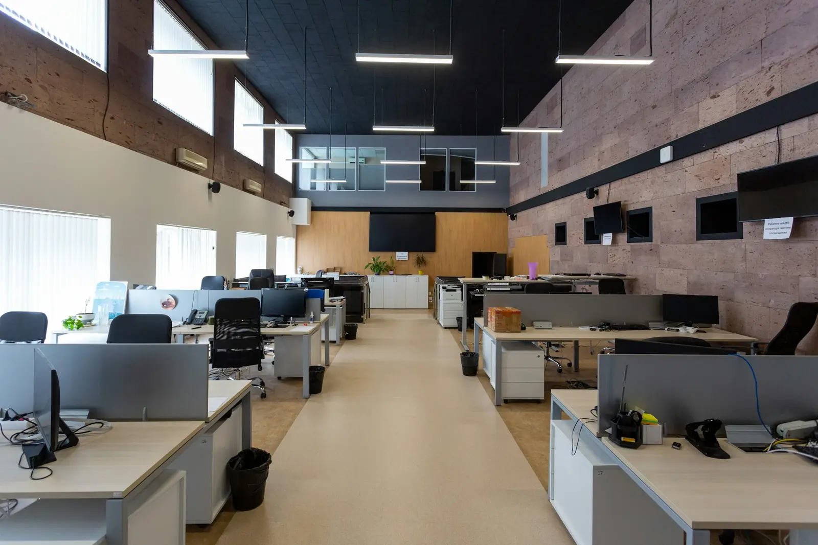 An open-plan office with rows of desks